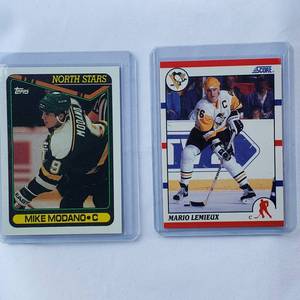 lot 206 image: Lot of 2 Mike Modano MINNESOTA North Stars 1990 Topps No. 348, Mario Lemieux 1990 Score No. 2