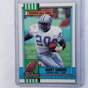 lot 260 image: Lot of 2 Barry Sanders 1990 Topps No. 352, Deion Sanders 1990 NFL Pro Set  No. 36