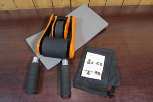 lot 36 image: LiveFit Non-Slip Portable Fitness Ab Roller w Knee Pad