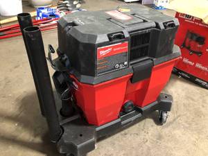 lot 7 image: Milwaukee M18 FUEL 9 Gal. Cordless DUAL-BATTERY WetDry Shop Vacuum with Filter, Hose, and Accessories Missing Parts   Customer Returns See Pictures