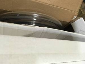 lot 36 image: Lot of 34 in. I.D. x 1 in. O.D. x 50 ft. Clear Vinyl Tubing with Dispenser Box by UDP Damaged   Customer Returns See Pictures