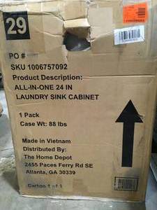 lot 46 image: Glacier Bay All-In-One Stainless Steel 24 in Laundry Sink with Faucet and Storage Cabinet in Cool Gray  Customer Returns See Pictures