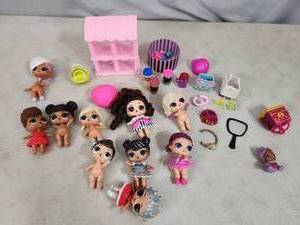 lot 64 image: LOL Surprise Dolls and Accessories