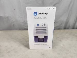 lot 103 image: New Eva Dry Petite Dehumidifier