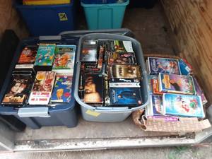 Three boxes of VHS tapes
