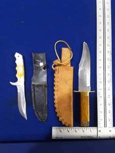Two hunting knives with sheaths