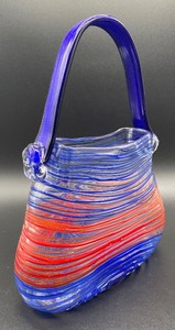 lot 149 image: Vibrant Art Glass Handbag with Blue and Red Accents