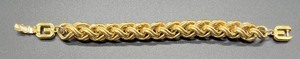 lot 127 image: Gold Colored Braided Bracelet by Givenchy