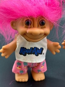 lot 174 image: Two Russ Brand Troll Kool Aide Dolls