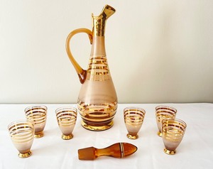 lot 71 image: Vintage Amber Gold Art Glass Hand Blown Decanter and Matching Shot Glasses