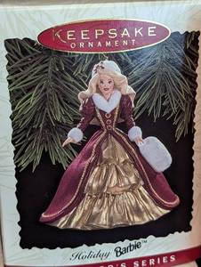 lot 225 image: Four Barbie Holiday Ornaments