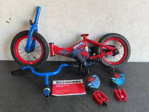 lot 49 image: Huffy 12 inch Marvel Spiderman Boys Red Bike with Training Wheels