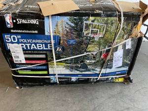 lot 92 image: Spalding 50 Polycarbonate Portable Basketball Hoop
