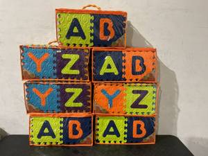 lot 112 image: LOT OF 7 Beautifloor Foam Alphabet Floor Tiles