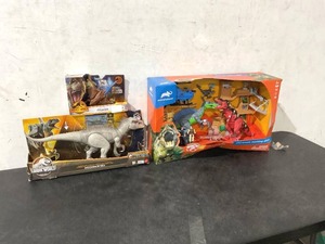 lot 133 image: LOT OF 4 Jurassic World, Animal Planet and Magic Tracks Dinosaur Toys