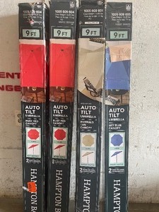 Lot of assorted Auto Tilt Patio Umbrellas varios colors 9 ft customer return see pictures