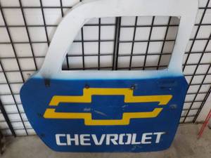 lot 2 image: New Metal CHEVOLET Door Dcor- Ind...