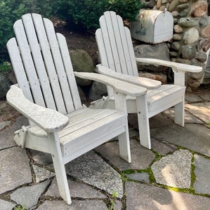 lot 18 image: Two Resin Folding Adirondack Chairs