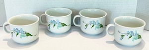 lot 53 image: Haviland Limoges Aluminate Pebble France My Garden Dinnerware Set of 4 Cups and 1 Plate