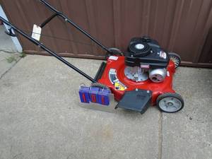 Yard Machine 20 push lawn mower. Looks nearly new. Tested & works. As shown.