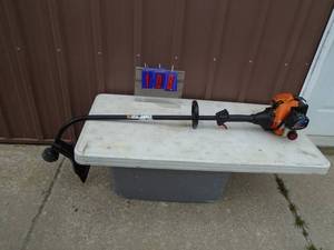 Remington weed trimmer. Looks nearly new. As shown.