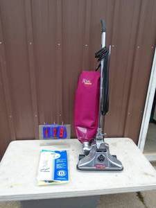 Royal upright vacuum with bags. Looks nearly new. As shown.