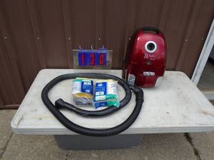 Royal canister vacuum with bags. Lightly used. Nice shape. As shown.