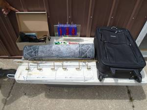 Assortment of luggage, rugs & cameras. As shown.
