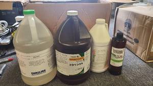Jugs of Glycerol, Hydrogen Peroxide, Aloe Vera Gel and Vegetable Glycerin