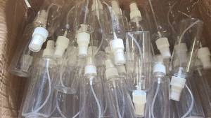 Box of small spritzer bottles