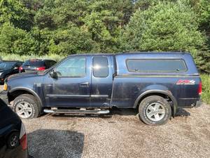 lot 100G image: 2003 Ford F-150 XLT - 4X4 - 2 OWNERS