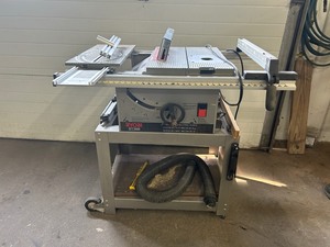 lot 1 image: Ryobi BT3000 Table Saw w Stand