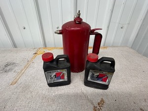 lot 62 image: Oil Canister and Oil