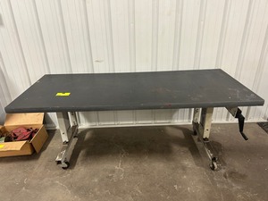 lot 76 image: Adjustable Heigh Table 72 x 30