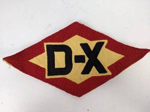 lot 976 image: Vintage Embroidered D-X Patch
