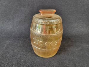 lot 1065 image: Vintage Lucky Bank Glass Barrel Coin Bank