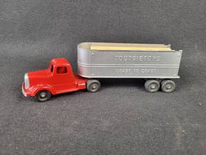 lot 959 image: Vintage Diecast Tootsie Toy Semi-Truck and Trailer with Logs Coast to Coast