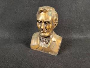lot 1068 image: National Bank of Commerce - Mankato, MN Abraham Lincoln Bust Metal Coin Bank
