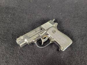 lot 1095 image: NICHOLS Army 45 Toy Cap Gun - WORKS
