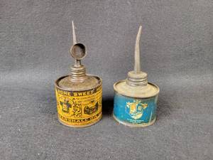 lot 1022 image: (2) Antique Oiler Cans - Maytag and Marshall Oil Co. Home Sweet Home