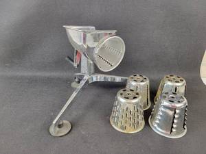 lot 999 image: Vintage Saladmaster Diecast Shredder with Multiple Blades
