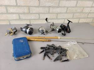 lot 821 image: Fishing Reels, Boat Cleats and Ice Fishing Rods - Great Lakes Bait Cast Reel, Eagle Claw Spin Cast reel, Pflueger Spincast Reel, Zebco Reel and Silstar Reel