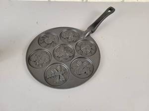 lot 869 image: Nordic Ware Silver Dollar Pancake Griddle - Backyard Bugs