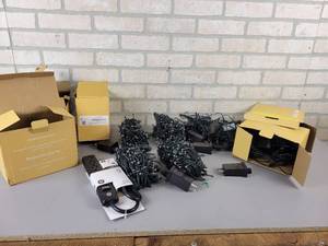 lot 882 image: (4) Strings of LED Lights and Many Power Supplies