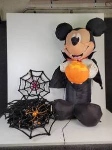 lot 51 image: Lot of Halloween Dcor - Mickey Mouse Vampire Blow Up Decoration & (18) Spiderweb Tinsel Decorations