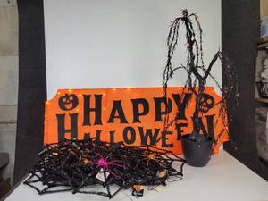 lot 52 image: Lot of Halloween Dcor - Lighted Happy Halloween Sign, Lighted Spooky Willow Tree, and (15) Spiderweb Tinsel Decorations