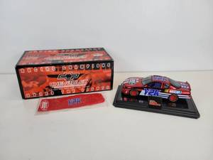 lot 93 image: Racing Champions 124 Scale Y2K Chevy Monte Carlo Die Cast Race Car