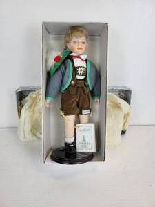 lot 129 image: Schneider German-Made Porcelain Doll
