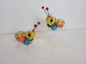 lot 134 image: Pair of New Old Stock Fisher-Price Queen Buzzy Bee Pull-Behind Toys