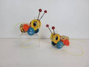 lot 135 image: Pair of New Old Stock Fisher-Price Queen Buzzy Bee Pull-Behind Toys